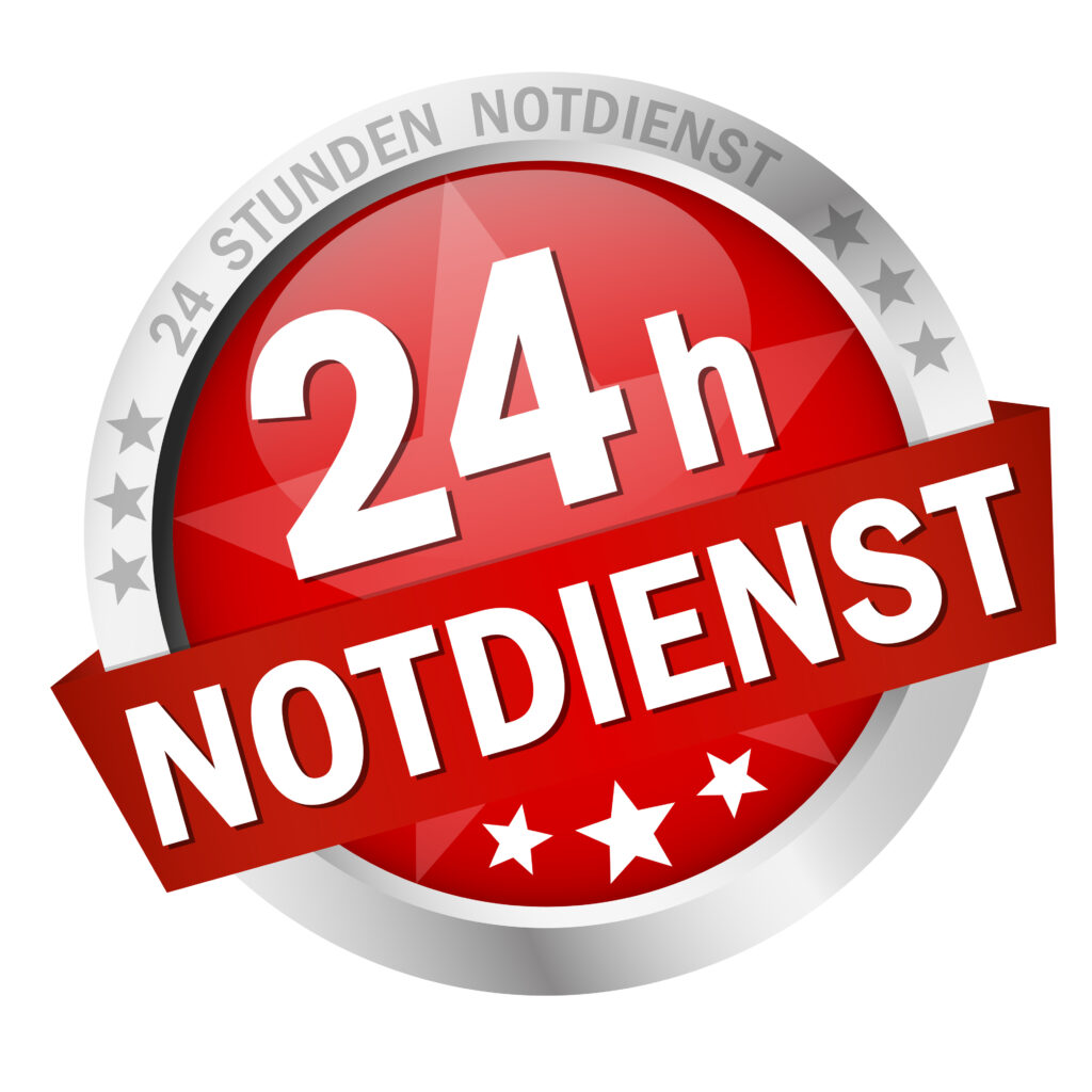 Rundes rotes und silbernes Logo mit der Aufschrift „24h NOTDIENST“ in großen weißen Buchstaben. Oben im Rand steht „24 STUNDEN NOTDIENST“, unten sind drei weiße Sterne auf rotem Hintergrund abgebildet. Das Design vermittelt Erreichbarkeit rund um die Uhr im Notfall.